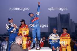 Giancarlo Fisichella (ITA) Benetton B196 Renault Mild Seven 1st position celebrate on podium