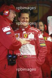 Michael Schumacher Scuderia Ferrari Marlboro 1st position talks with Ross Brawn (GBR)