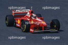 Michael Schumacher (GER) Ferrari F310B Scuderia Ferrari Marlboro 1st position