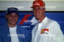 Jacques Villeneuve (CDN) Williams and Michael Schumacher (GER) Ferrari