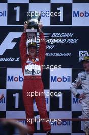 Michael Schumacher (GER) Scuderia Ferrari Marlboro 1st position celebrate on podium