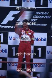 Michael Schumacher (GER) Scuderia Ferrari Marlboro 1st position celebrate on podium