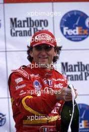 Alessandro Alex Zanardi (ITA) Reynard 97I Honda Target Chip Ganassi Racing celebrate on podium