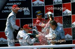David Coulthard (GBR) McLaren 2nd position Mika Hakkinen (FIN) Mercedes 1st position Michael Schumacher (GER) Ferrari 3rd position celebrate podium with Monsour Ojjeh (KSA)