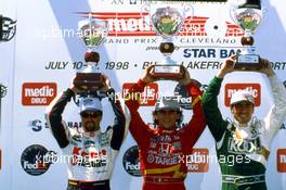Alessandro Alex Zanardi (ITA) Reynard 98I Honda Target Chip Ganassi Racing 1st position celebrate on podium
