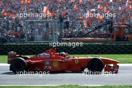 Michael Schumacher (GER) Ferrari F399 1st position at Rivazza corner