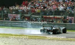 Mika Hakkinen (FIN) Mc Laren MP4/14 Mercedes retires after spin at Prima Variante during race