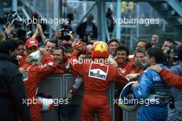 Michael Schumacher (GER) Ferrari F1 2000 1st position celebrate victory