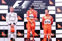 04.03.2001 Melbourne, Australien, David Coulthard, Michael Schumacher und Rubens Barrichllo bei Siegerehrung heute nach Schumachers Sieg beim Formel 1 Grand Prix im australischen Melbourne.  c xpb.cc