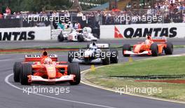 04.03.2001 Melbourne, Australien, Michael Schumacher (Ferrari) vor David Coulthard (McLaren) und Rubens Barrichello (Ferrari) heute beim Formel 1 Grand Prix im australischen Melbourne. c xpb.cc