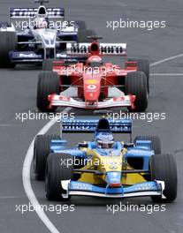 03.03.2002 Melbourne, Australien, Sonntag, Strecke, Jarno Trulli, Michael Schumacher und  Juan Pablo Montoya am GP in Melbourne (MEL)c xpb.cc Mail: info@xpb.cc  Datenbank: www.xpb.cc 