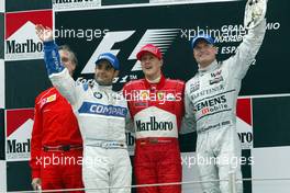 28.04.2002 Barcelona, Spanien, Barcelona, Podium nach dem Formel 1 Grand Prix (GP) von Spanien 2002, Juan Pablo Montoya (2ter), Michael Schumacher (1ter) und David Coulthard (3ter), Sonntag, Box c xpb.cc Email: info@xpb.cc, weitere Bilder auf der Datenbank: www.xpb.cc