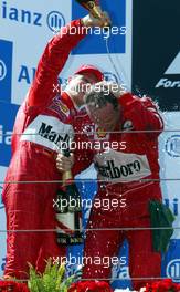 23.06.2002 Nürburg, Deutschland, F1 am Nürburgring, Podium am Sonntag, Michael Schumacher 2ter, Rubens Barrichello 1ter, Boxengasse, Formel 1 Grand Prix (GP) von Europa 2002, Nuerburg c xpb.cc Email: info@xpb.cc, weitere Bilder auf der Datenbank: www.xpb.cc