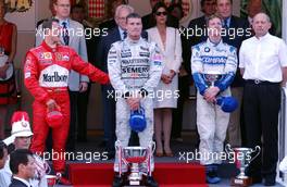 26.05.2002 Monte Carlo, Monaco, F1 in Monaco, Sonntag, Podium / Park Ferme, Michael Schumacher 2ter, David Coulthard 1ter und Ralf Schumacher 3ter auf dem Podium, Formel 1 Grand Prix (GP) von Monaco 2002 in Monte Carlo, Monaco c xpb.cc Email: info@xpb.cc, weitere Bilder auf der Datenbank: www.xpb.cc