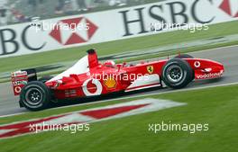 28.09.2002 Indianapolis, USA, F1 in Indianapolis, Samstag, Michael Schumacher (Ferrari, F2002, Nr. 01) auf der Strecke, 2002 SAP United States Grand Prix - (USGP, Formel 1, USA, Grand Prix, GP). c xpb.cc - weitere Bilder auf der Datenbank unter www.xpb.cc - Email: info@xpb.cc