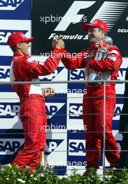 29.09.2002 Indianapolis, USA, F1 in Indianapolis, Sonntag 29.09.2002, Podium, Michael Schumacher und Rubens Barrichello, 2002 SAP United States Grand Prix - (USGP, Formel 1, USA, Grand Prix, GP). c xpb.cc - weitere Bilder auf der Datenbank unter www.xpb.cc - Email: info@xpb.cc