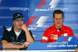 27.09.2002 Indianapolis, USA, F1 in Indianapolis, Freitag, FIA Pressekonferenz, Ralf Schumacher (BMW WilliamsF1) und Michael Schumacher (Ferrari), 2002 SAP United States Grand Prix - (USGP, Formel 1, USA, Grand Prix, GP). c xpb.cc - weitere Bilder auf der Datenbank unter www.xpb.cc - Email: info@xpb.cc