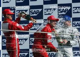 29.09.2002 Indianapolis, USA, F1 in Indianapolis, Sonntag 29.09.2002, Podium, Michael Schumacher, Rubens Barrichello, David Coulthard, 2002 SAP United States Grand Prix - (USGP, Formel 1, USA, Grand Prix, GP). c xpb.cc - weitere Bilder auf der Datenbank unter www.xpb.cc - Email: info@xpb.cc