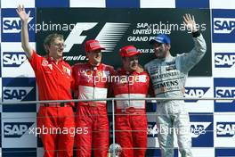 29.09.2002 Indianapolis, USA, F1 in Indianapolis, Sonntag 29.09.2002, Podium, P. Martinelli, Michael Schumacher, Rubens Barrichello, David Coulthard, 2002 SAP United States Grand Prix - (USGP, Formel 1, USA, Grand Prix, GP). c xpb.cc - weitere Bilder auf der Datenbank unter www.xpb.cc - Email: info@xpb.cc