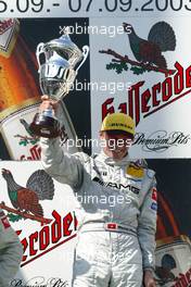 07.09.2003 Zeltweg, Österreich, Podium, Marcel Fässler (CHE), AMG-Mercedes, Portrait (1st) - DTM 2003 in Zeltweg, Grand-Prix-Kurs des A1-Ring, Österreich (Deutsche Tourenwagen Masters)  - Weitere Bilder auf www.xpb.cc, eMail: info@xpb.cc - Belegexemplare senden.  c Copyright: Kennzeichnung mit: Miltenburg / xpb.cc