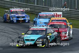 07.09.2003 Zeltweg, Österreich, Manuel Reuter (GER), OPC Team Holzer, Opel Astra V8 Coupé, in front of Peter Terting (GER), S line Audi Junior Team, Abt-Audi TT-R, Jeroen Bleekemolen (NED), OPC Euroteam, Opel Astra V8 Coupé, Stefan Mücke (GER), Service 24h AMG-Mercedes, Mercedes-Benz CLK-DTM, and Karl Wendlinger (AUT), PlayStation 2 Red Bull Abt-Audi, Abt-Audi TT-R - DTM 2003 in Zeltweg, Grand-Prix-Kurs des A1-Ring, Österreich (Deutsche Tourenwagen Masters)  - Weitere Bilder auf www.xpb.cc, eMail: info@xpb.cc - Belegexemplare senden.  c Copyright: Kennzeichnung mit: Miltenburg / xpb.cc