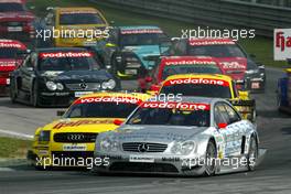 07.09.2003 Zeltweg, Österreich, Start of the race, Christijan Albers (NED), Express-Service AMG-Mercedes, Mercedes-Benz CLK-DTM, and Laurent Aiello (FRA), Hasseröder Abt-Audi, Abt-Audi TT-R - DTM 2003 in Zeltweg, Grand-Prix-Kurs des A1-Ring, Österreich (Deutsche Tourenwagen Masters)  - Weitere Bilder auf www.xpb.cc, eMail: info@xpb.cc - Belegexemplare senden.  c Copyright: Kennzeichnung mit: Miltenburg / xpb.cc