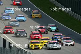 07.09.2003 Zeltweg, Österreich, Start of the race, the group after Marcel Fässler (CHE), AMG-Mercedes, Mercedes-Benz CLK-DTM, fighting for second position before the first corner - DTM 2003 in Zeltweg, Grand-Prix-Kurs des A1-Ring, Österreich (Deutsche Tourenwagen Masters)  - Weitere Bilder auf www.xpb.cc, eMail: info@xpb.cc - Belegexemplare senden.  c Copyright: Kennzeichnung mit: Miltenburg / xpb.cc