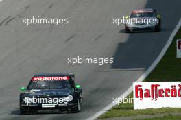 07.09.2003 Zeltweg, Österreich, Marcel Fässler (CHE), AMG-Mercedes, Mercedes-Benz CLK-DTM, leading for Bernd Schneider (GER), Vodafone AMG-Mercedes, Mercedes-Benz CLK-DTM - DTM 2003 in Zeltweg, Grand-Prix-Kurs des A1-Ring, Österreich (Deutsche Tourenwagen Masters)  - Weitere Bilder auf www.xpb.cc, eMail: info@xpb.cc - Belegexemplare senden.  c Copyright: Kennzeichnung mit: Miltenburg / xpb.cc