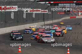 08.06.2003 Klettwitz, Deutschland, Start of the race, Bernd Schneider (GER), Vodafone AMG-Mercedes, Mercedes-Benz CLK-DTM, leading the field into the first corner - DTM 2003 in Klettwitz, EuroSpeedway Lausitz, Lausitzring (Deutsche Tourenwagen Masters)  - Weitere Bilder auf www.xpb.cc, eMail: info@xpb.cc - Belegexemplare senden. c Copyright: Kennzeichnung mit: Miltenburg / xpb.cc