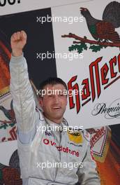 08.06.2003 Klettwitz, Deutschland, Podium, Bernd Schneider (GER), Vodafone AMG-Mercedes, Portrait (1st) - DTM 2003 in Klettwitz, EuroSpeedway Lausitz, Lausitzring (Deutsche Tourenwagen Masters)  - Weitere Bilder auf www.xpb.cc, eMail: info@xpb.cc - Belegexemplare senden. c Copyright: Kennzeichnung mit: Miltenburg / xpb.cc