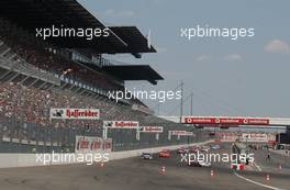 08.06.2003 Klettwitz, Deutschland, Start of the warm-up / formation lap, in front of a packed grandstand - DTM 2003 in Klettwitz, EuroSpeedway Lausitz, Lausitzring (Deutsche Tourenwagen Masters)  - Weitere Bilder auf www.xpb.cc, eMail: info@xpb.cc - Belegexemplare senden. c Copyright: Kennzeichnung mit: Miltenburg / xpb.cc