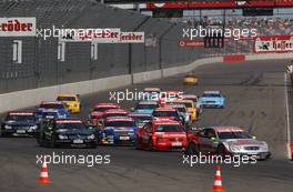 08.06.2003 Klettwitz, Deutschland, Start of the race, with Bernd Schneider (GER), Vodafone AMG-Mercedes, Mercedes-Benz CLK-DTM, leading the field into the first corner - DTM 2003 in Klettwitz, EuroSpeedway Lausitz, Lausitzring (Deutsche Tourenwagen Masters)  - Weitere Bilder auf www.xpb.cc, eMail: info@xpb.cc - Belegexemplare senden. c Copyright: Kennzeichnung mit: Miltenburg / xpb.cc