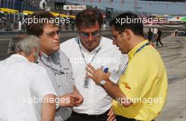 06.06.2003 Klettwitz, Deutschland, From left to right: Hans Werner Aufrecht (GER), Team Chef HWA, ITR President, Norbert Haug (GER), Sporting Director Mercedes-Benz, Walter Mertes (GER), Marketing/Sponsoring ITR (DTM), and Hans-Jurgen Abt (GER), Teamchef Abt-Audi, talking about taking the banked oval corner out of the circuit for the remainder of the weekend - DTM 2003 in Klettwitz, EuroSpeedway Lausitz, Lausitzring (Deutsche Tourenwagen Masters)  - Weitere Bilder auf www.xpb.cc, eMail: info@xpb.cc - Belegexemplare senden. c Copyright: Kennzeichnung mit: Miltenburg / xpb.cc