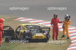 06.06.2003 Klettwitz, Deutschland, Laurent Aiello (FRA), Hasseröder Abt-Audi, Abt-Audi TT-R, looking at his damaged car after spinning into the concrete barrier at the end of the session - DTM 2003 in Klettwitz, EuroSpeedway Lausitz, Lausitzring (Deutsche Tourenwagen Masters)  - Weitere Bilder auf www.xpb.cc, eMail: info@xpb.cc - Belegexemplare senden. c Copyright: Kennzeichnung mit: Miltenburg / xpb.cc