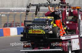 06.06.2003 Klettwitz, Deutschland, The heavily damaged car of Christian Abt (GER), Hasseröder Abt-Audi, Abt-Audi TT-R, taken away on a truck after crashing into the concrete barrier (like his teammate Laurent Aiello (FRA), Hasseröder Abt-Audi, Abt-Audi TT-R in the morning) - DTM 2003 in Klettwitz, EuroSpeedway Lausitz, Lausitzring (Deutsche Tourenwagen Masters)  - Weitere Bilder auf www.xpb.cc, eMail: info@xpb.cc - Belegexemplare senden. c Copyright: Kennzeichnung mit: Miltenburg / xpb.cc