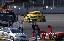 06.06.2003 Klettwitz, Deutschland, The heavily damaged car of Christian Abt (GER), Hasseröder Abt-Audi, Abt-Audi TT-R, taken away on a truck after crashing into the concrete barrier (like his teammate Laurent Aiello (FRA), Hasseröder Abt-Audi, Abt-Audi TT-R in the morning) - DTM 2003 in Klettwitz, EuroSpeedway Lausitz, Lausitzring (Deutsche Tourenwagen Masters)  - Weitere Bilder auf www.xpb.cc, eMail: info@xpb.cc - Belegexemplare senden. c Copyright: Kennzeichnung mit: Miltenburg / xpb.cc