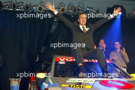 05.10.2003 Hockenheim, Deutschland, DTM Gala Party, Price Giving Ceremony - Bernd Schneider (GER), Vodafone AMG-Mercedes, Portrait, sitting on top of his championship winning Mercedes-Benz CLK-DTM - DTM 2003 in Hockenheim, Grand-Prix-Kurs des Hockenheimring Baden-Württemberg (Deutsche Tourenwagen Masters)  - Weitere Bilder auf www.xpb.cc, eMail: info@xpb.cc - Belegexemplare senden.  c Copyright: Kennzeichnung mit: Miltenburg / xpb.cc