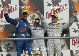 05.10.2003 Hockenheim, Deutschland, DTM 2003 am Hockenheimring, Podium, Mattias Ekström (SWE), PlayStation 2 Red Bull Abt-Audi, Abt-Audi TT-R, Jean Alesi (FRA), AMG-Mercedes, Mercedes-Benz CLK-DTM, Marcel Fässler (CHE), AMG-Mercedes, Mercedes-Benz CLK-DTM - DTM 2003 in Hockenheim, Grand-Prix-Kurs des Hockenheimring Baden-Württemberg (Deutsche Tourenwagen Masters) - Weitere Bilder auf www.xpb.cc, eMail: info@xpb.cc - Belegexemplare senden. c Copyrightkennzeichnung mit: xpb.cc