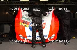 23.05.2003 Nürburg, Deutschland, Mercedes mechanics do a quick repair on the car of Katsutomo Kaneishi (JPN), ARTA AMG-Mercedes - DTM 2003 in Nürburg, Grand-Prix-Kurs des Nürburgring (Deutsche Tourenwagen Masters)  - Weitere Bilder auf www.xpb.cc, eMail: info@xpb.cc - Belegexemplare senden. c Copyright: Kennzeichnung mit: Miltenburg / xpb.cc