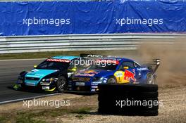 21.09.2003 Zandvoort, Niederlande, Mattias Ekström (SWE), PlayStation 2 Red Bull Abt-Audi, Abt-Audi TT-R, overtaking Manuel Reuter (GER), OPC Team Holzer, Opel Astra V8 Coupé, for which strangly enough Manuel Reuter (GER), OPC Team Holzer, Opel Astra V8 Coupé later received a warning - DTM 2003 in Zandvoort, Grand-Prix-Kurs des Circuit Park Zandvoort, Niederlande, The Netherlands (Deutsche Tourenwagen Masters)  - Weitere Bilder auf www.xpb.cc, eMail: info@xpb.cc - Belegexemplare senden.  c Copyright: Kennzeichnung mit: Miltenburg / xpb.cc