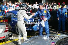 21.09.2003 Zandvoort, Niederlande, Christijan Albers (NED), Express-Service AMG-Mercedes, Portrait, receiving congratulations from Mattias Ekström (SWE), PlayStation 2 Red Bull Abt-Audi, Portrait - DTM 2003 in Zandvoort, Grand-Prix-Kurs des Circuit Park Zandvoort, Niederlande, The Netherlands (Deutsche Tourenwagen Masters)  - Weitere Bilder auf www.xpb.cc, eMail: info@xpb.cc - Belegexemplare senden.  c Copyright: Kennzeichnung mit: Miltenburg / xpb.cc