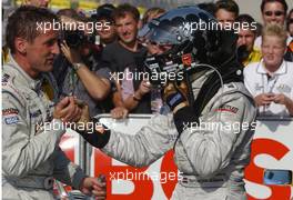 21.09.2003 Zandvoort, Niederlande, Bernd Schneider (GER), Vodafone AMG-Mercedes, Portrait (2nd, left), congratulates Christijan Albers (NED), Express-Service AMG-Mercedes, Portrait (1st, right) - DTM 2003 in Zandvoort, Grand-Prix-Kurs des Circuit Park Zandvoort, Niederlande, The Netherlands (Deutsche Tourenwagen Masters)  - Weitere Bilder auf www.xpb.cc, eMail: info@xpb.cc - Belegexemplare senden.  c Copyright: Kennzeichnung mit: Van Egmond / xpb.cc