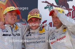 22.06.2003 Nürnberg, Deutschland, Podium, Christijan Albers (NED), Express-Service AMG-Mercedes (1st, center), Marcel Fässler (CHE), AMG-Mercedes (2nd, left), Bernd Schneider (GER), Vodafone AMG-Mercedes (3rd, right) - DTM 2003 in Nürnberg, Norisring (Deutsche Tourenwagen Masters)  - Weitere Bilder auf www.xpb.cc, eMail: info@xpb.cc - Belegexemplare senden. c Copyright: Kennzeichnung mit: Miltenburg / xpb.cc