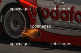 22.06.2003 Nürnberg, Deutschland, Fire from the exhaust from the car of Bernd Schneider (GER), Vodafone AMG-Mercedes, Mercedes-Benz CLK-DTM - DTM 2003 in Nürnberg, Norisring (Deutsche Tourenwagen Masters)  - Weitere Bilder auf www.xpb.cc, eMail: info@xpb.cc - Belegexemplare senden. c Copyright: Kennzeichnung mit: Miltenburg / xpb.cc