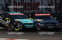 22.06.2003 Nürnberg, Deutschland, Marcel Fässler (CHE), AMG-Mercedes, Mercedes-Benz CLK-DTM, overtakes Manuel Reuter (GER), OPC Team Holzer, Opel Astra V8 Coupé, the hard way - DTM 2003 in Nürnberg, Norisring (Deutsche Tourenwagen Masters)  - Weitere Bilder auf www.xpb.cc, eMail: info@xpb.cc - Belegexemplare senden. c Copyright: Kennzeichnung mit: Miltenburg / xpb.cc