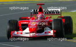 08.03.2003 Melbourne, Australien, MEL, Formel1, Samstag, Training, Michael Schumacher (D, 01), Scuderia Ferrari Marlboro, F2002, auf der Strecke (Track) mit einem Ausrutscher ins Gras - Albert Park Circuit, (Fosters Australian Grand Prix 2003, Victoria, Australia, Formel 1, F1)  c Copyright: Photos mit - xpb.cc - kennzeichnen, weitere Bilder auf www.xpb.cc, eMail: info@xpb.cc - Belegexemplare senden.