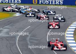 09.03.2003 Melbourne, Australien, MEL, Formel1, Sonntag, Start zum GP, Michael Schumacher (D, 01), Scuderia Ferrari Marlboro, F2002, auf der Strecke (Track) vor dem Feld - Albert Park Circuit, (Fosters Australian Grand Prix 2003, Victoria, Australia, Formel 1, F1)  c Copyright: Photos mit - xpb.cc - kennzeichnen, weitere Bilder auf www.xpb.cc, eMail: info@xpb.cc - Belegexemplare senden.