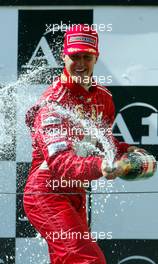 18.05.2003 Spielberg, Österreich, AT, Formel1, Sonntag, Podium, Michael Schumacher (D, Ferrari) - Formel 1 Grand Prix (GP) von Austria 2003 auf dem A1 Ring, Oesterreich, Zeltweg, Spielberg, Austria - Weitere Bilder auf www.xpb.cc, eMail: info@xpb.cc - Belegexemplare senden. Abdruck ist honorarpflichtig. c Copyrightnachweis: photo4 / xpb.cc - LEGAL NOTICE: THIS PICTURE IS NOT FOR ITALY PRINT USE, KEINE PRINT BILDNUTZUNG IN ITALIEN!