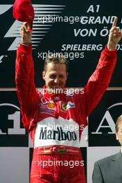 18.05.2003 Spielberg, Österreich, AT, Formel1, Sonntag, Podium, Michael Schumacher (D, Ferrari) - Formel 1 Grand Prix (GP) von Austria 2003 auf dem A1 Ring, Oesterreich, Zeltweg, Spielberg, Austria - Weitere Bilder auf www.xpb.cc, eMail: info@xpb.cc - Belegexemplare senden. Abdruck ist honorarpflichtig. c Copyrightnachweis: xpb.cc