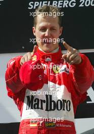 18.05.2003 Spielberg, Österreich, AT, Formel1, Sonntag, Podium, Michael Schumacher (D, Ferrari) - Formel 1 Grand Prix (GP) von Austria 2003 auf dem A1 Ring, Oesterreich, Zeltweg, Spielberg, Austria - Weitere Bilder auf www.xpb.cc, eMail: info@xpb.cc - Belegexemplare senden. Abdruck ist honorarpflichtig. c Copyrightnachweis: xpb.cc